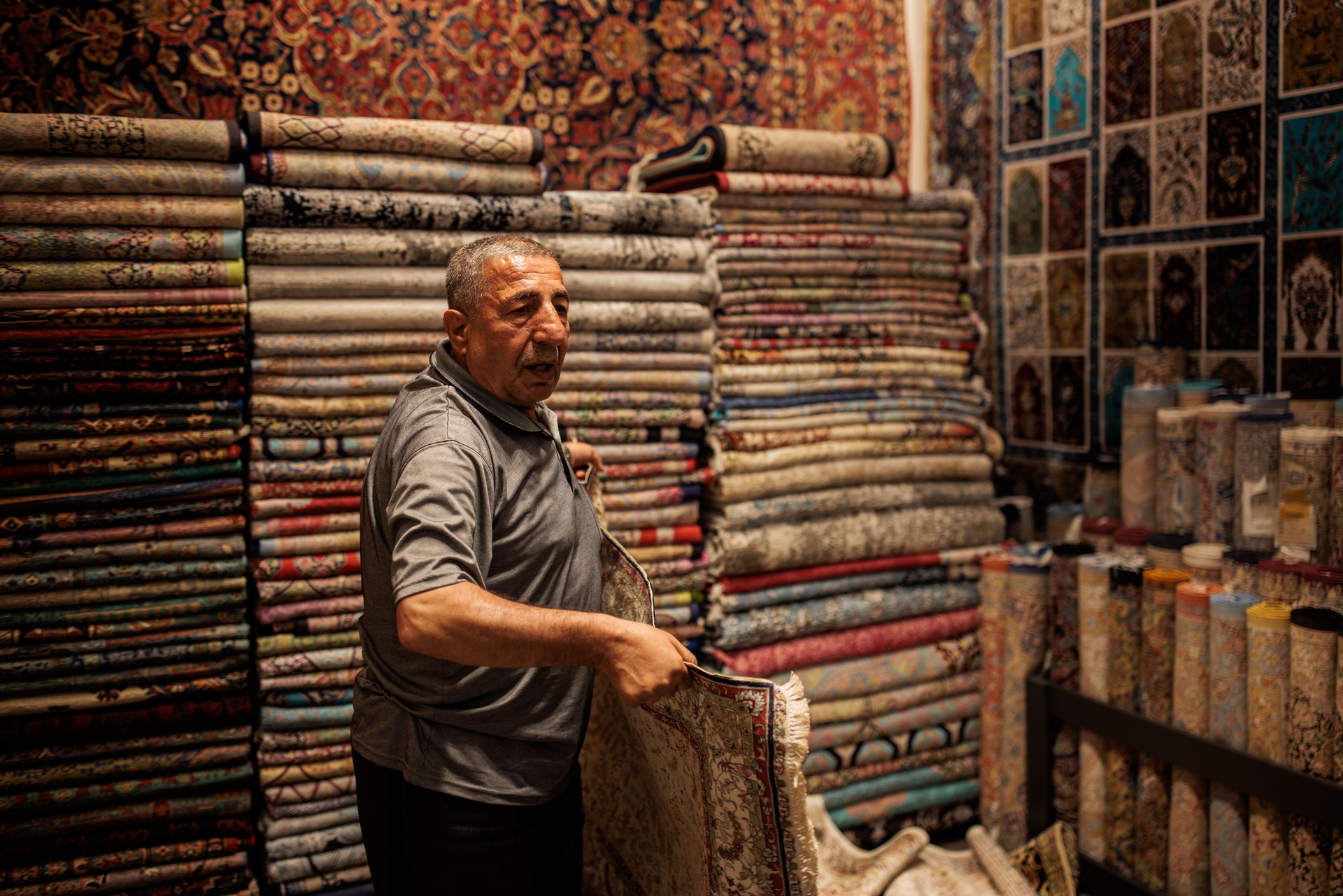 Man working in a carpet store